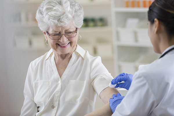 woman having flu jab